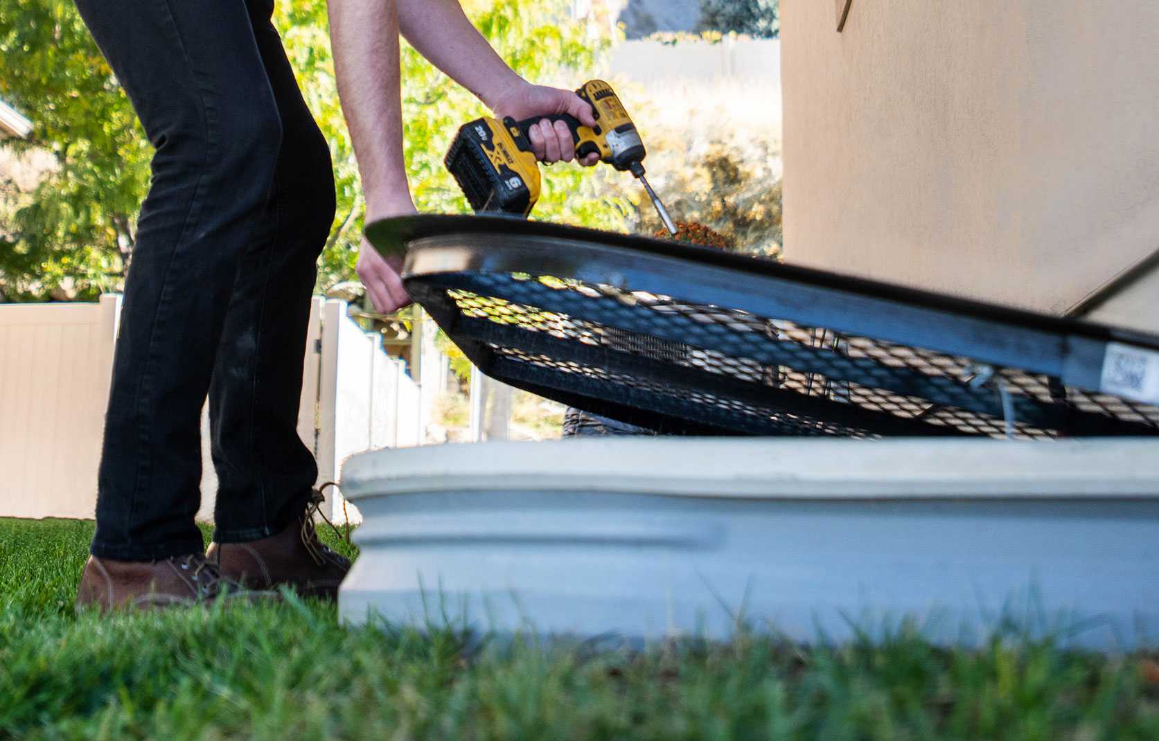 Installing a window well cover